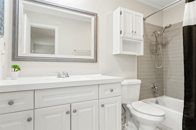 full bathroom with vanity, shower / bath combination with curtain, and toilet