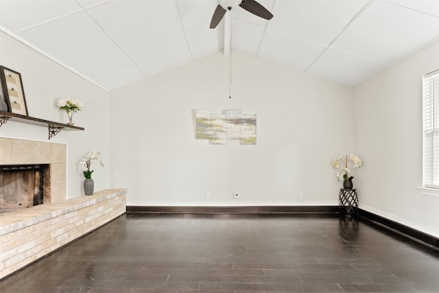 unfurnished living room featuring lofted ceiling with beams, hardwood / wood-style floors, and ceiling fan