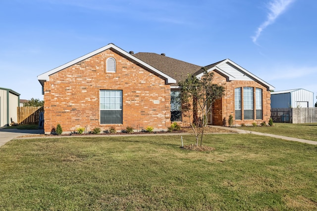 view of front of home with a front lawn