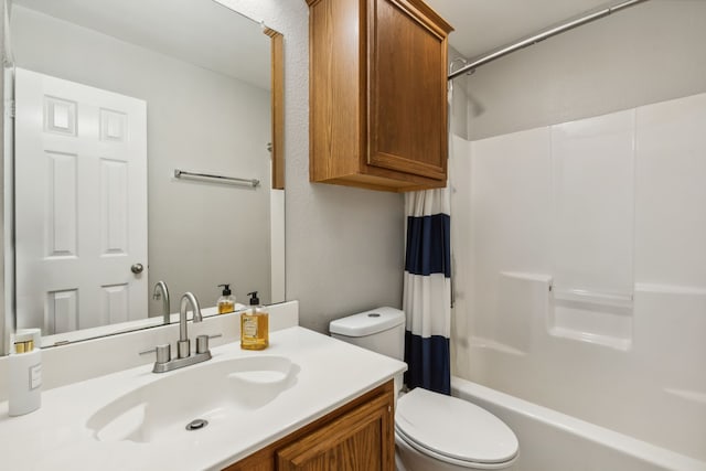 full bathroom with vanity, shower / bath combo with shower curtain, and toilet