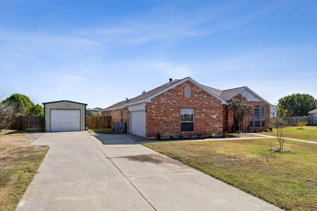 ranch-style house with a front yard and a garage