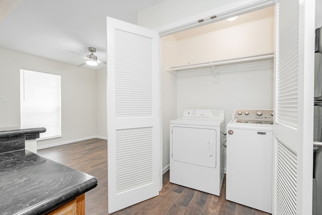 laundry room with washer and clothes dryer, ceiling fan, and dark hardwood / wood-style flooring