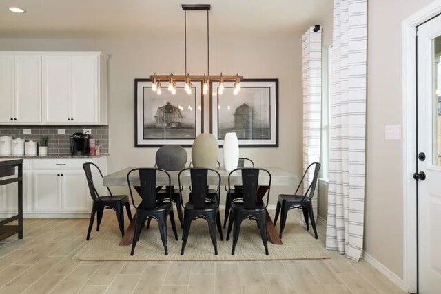 dining space featuring light hardwood / wood-style flooring