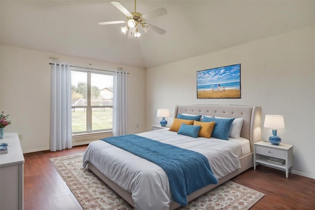 bedroom featuring vaulted ceiling, ceiling fan, and dark wood-type flooring