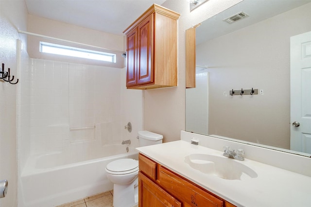 full bathroom with toilet, vanity, tile patterned floors, and tub / shower combination