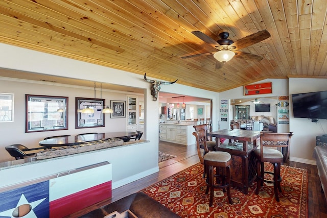 dining area featuring ceiling fan, vaulted ceiling, wood ceiling, and dark hardwood / wood-style flooring