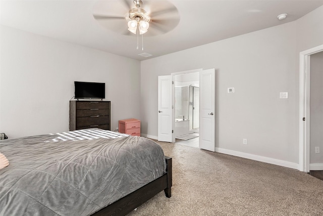 bedroom featuring ceiling fan, carpet floors, and ensuite bath