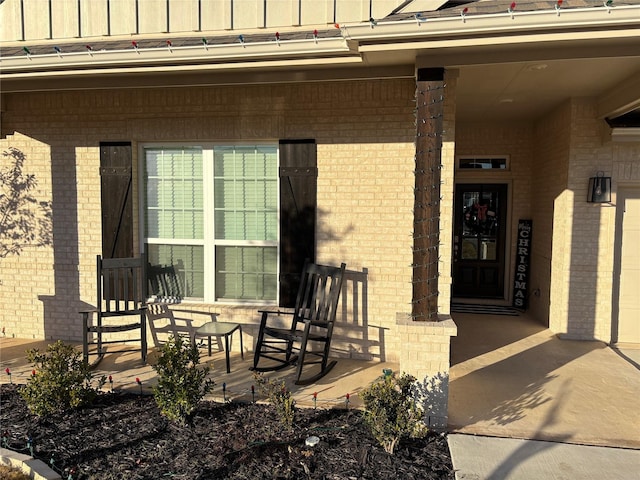 doorway to property featuring a porch