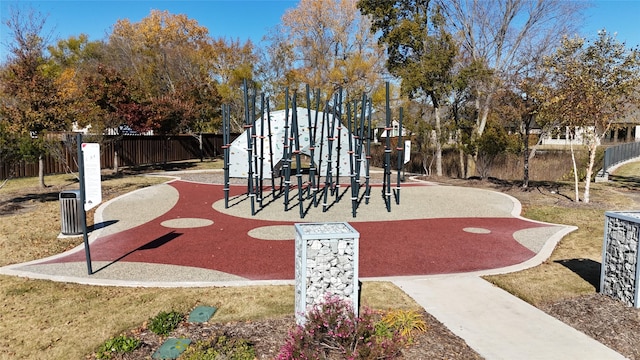 view of community with a playground and a lawn