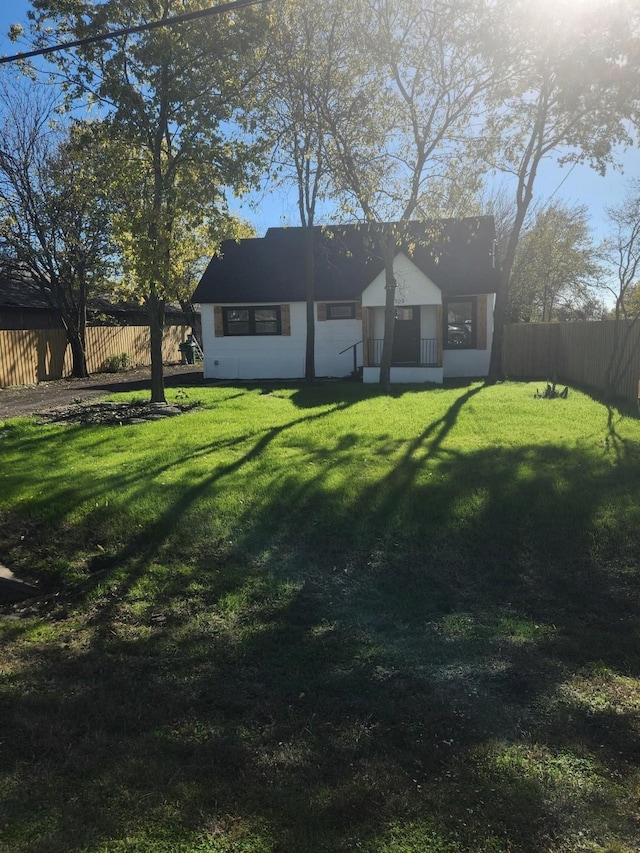 exterior space with a front yard