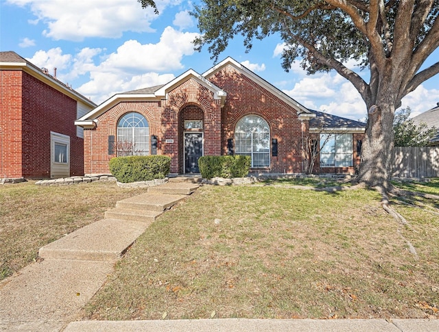 front facade with a front lawn