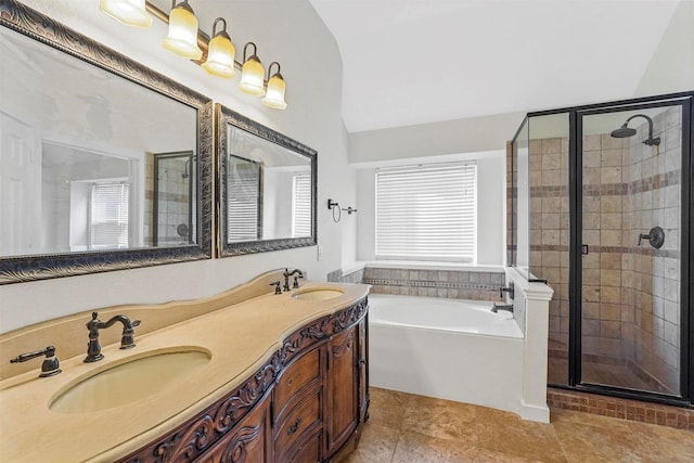 bathroom with vaulted ceiling, vanity, separate shower and tub, and tile patterned flooring