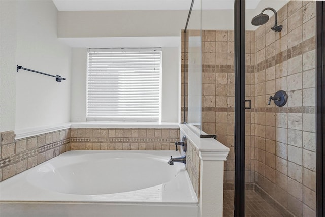 bathroom with shower with separate bathtub