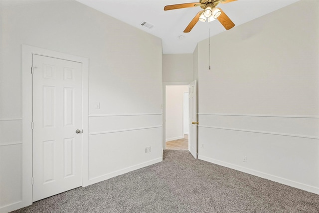 unfurnished bedroom with ceiling fan and carpet flooring