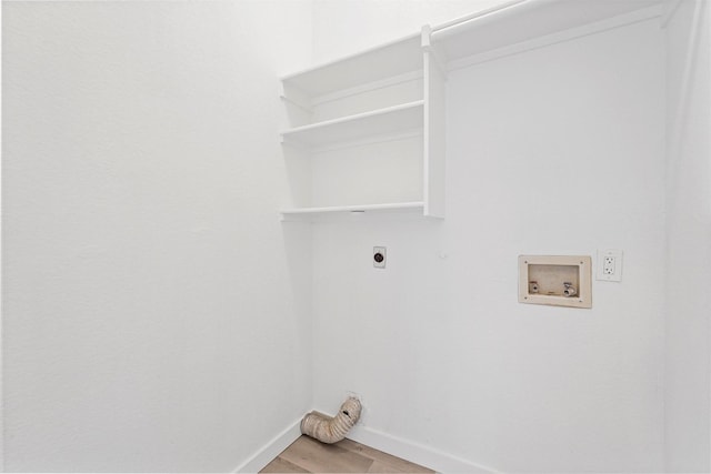 laundry room with hookup for a washing machine, electric dryer hookup, and light hardwood / wood-style flooring