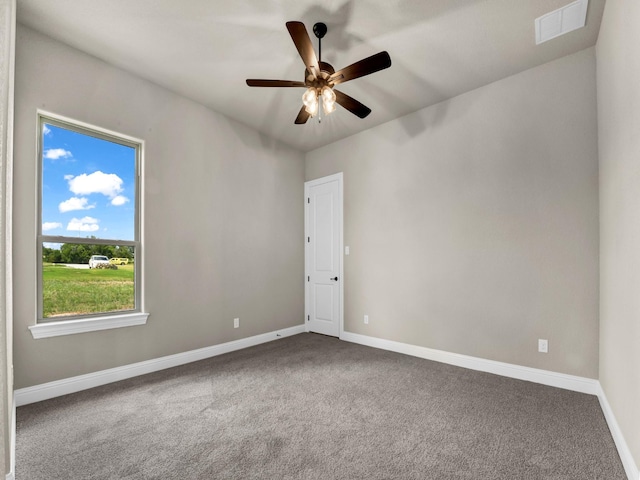 unfurnished room featuring carpet and ceiling fan