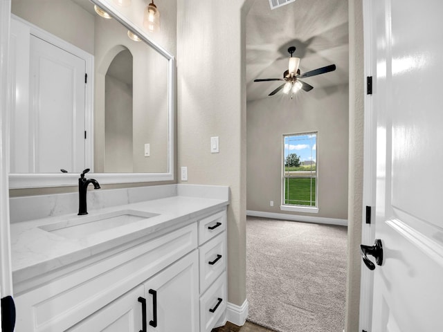 bathroom featuring vanity and ceiling fan