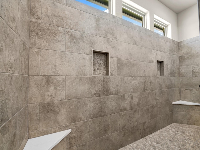 interior space with a tile shower