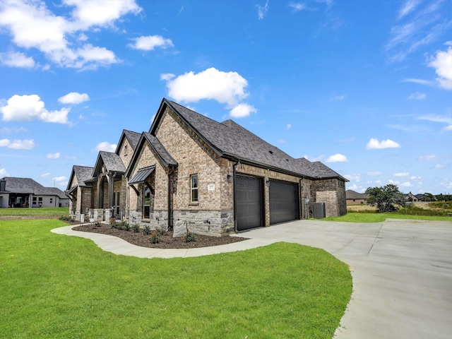 view of property exterior with a lawn, a garage, and central AC