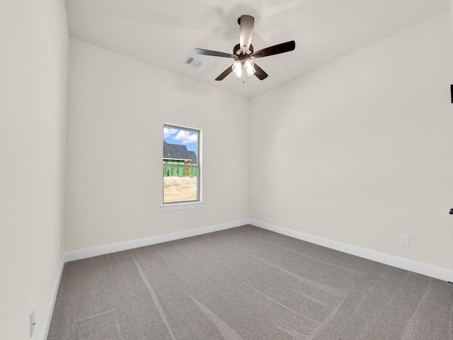 unfurnished room featuring carpet and ceiling fan