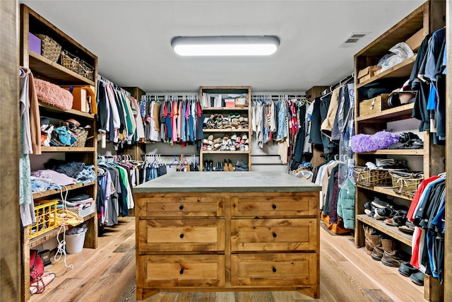 walk in closet featuring light wood-type flooring