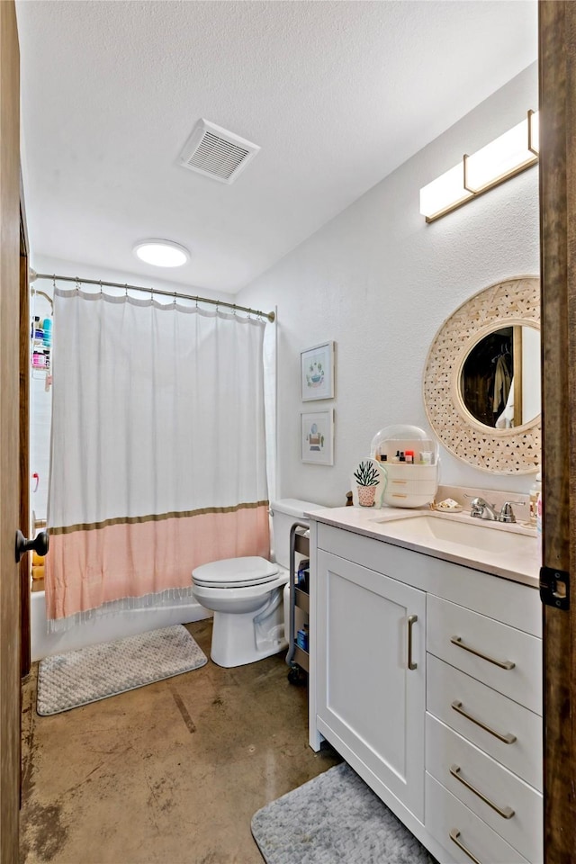 full bathroom with concrete flooring, vanity, toilet, shower / bathtub combination with curtain, and a textured ceiling