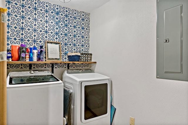 washroom featuring electric panel and washing machine and dryer