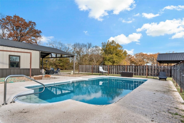 view of swimming pool featuring a patio