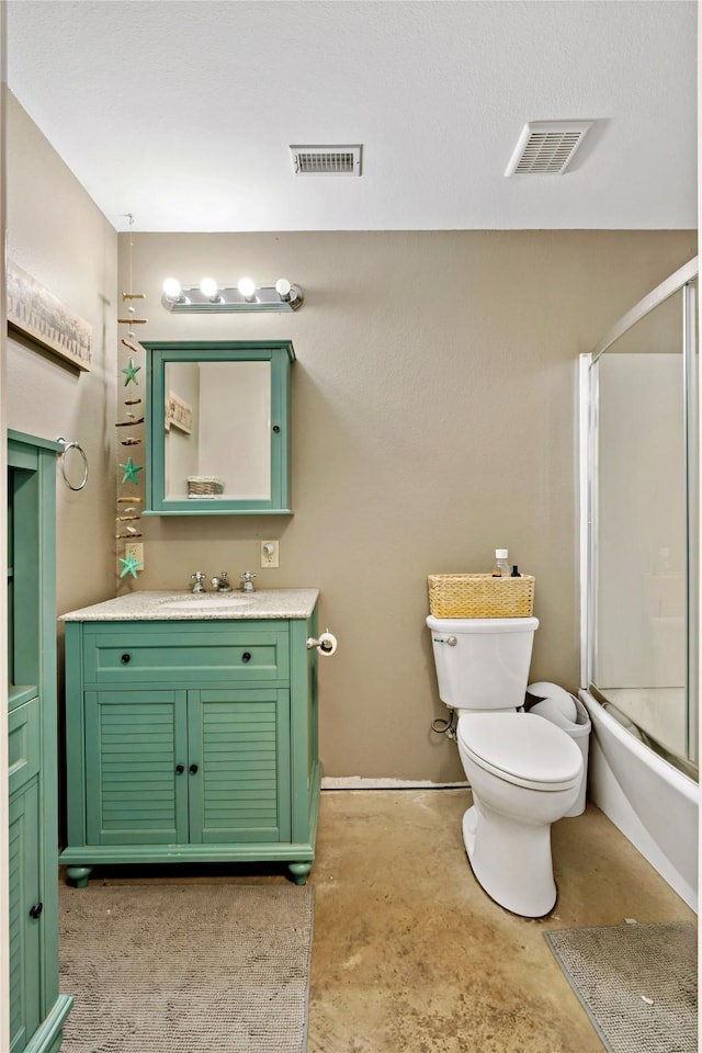 full bathroom featuring toilet, vanity, shower / bath combination with glass door, and concrete floors