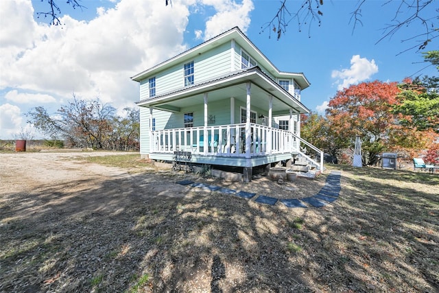 view of front of property featuring covered porch