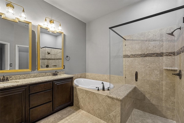 bathroom with separate shower and tub, tile patterned flooring, and vanity