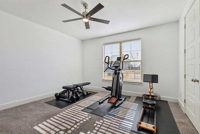 workout room featuring carpet and ceiling fan