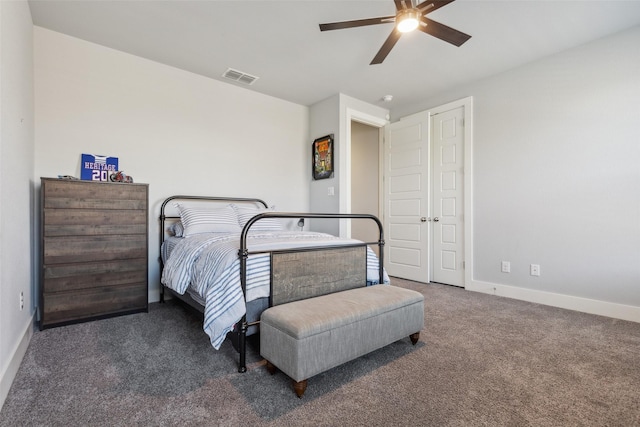 carpeted bedroom featuring ceiling fan