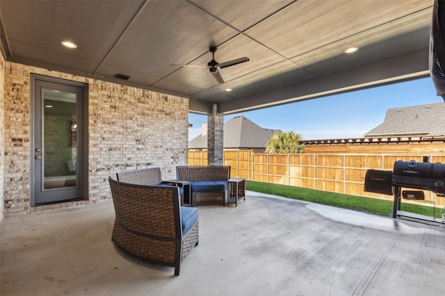 view of patio / terrace featuring ceiling fan and a grill