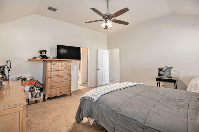 bedroom with ceiling fan, light colored carpet, and lofted ceiling