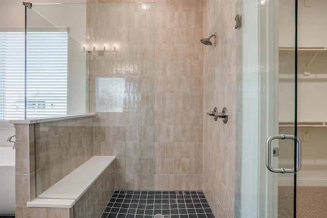 bathroom featuring an enclosed shower