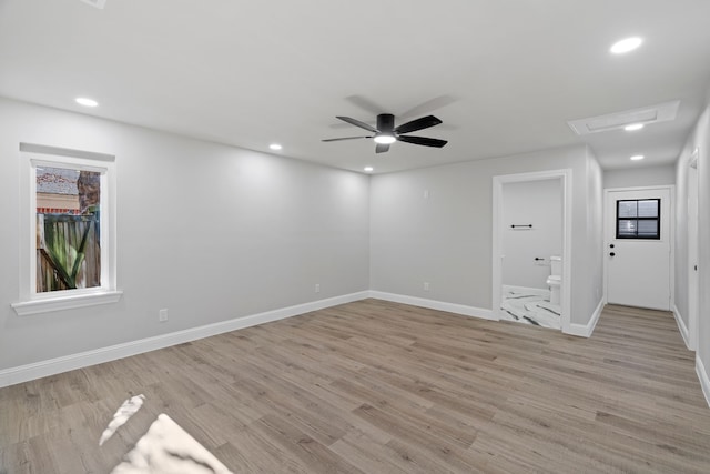 spare room featuring ceiling fan and light hardwood / wood-style floors