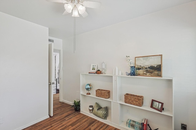 hall with dark hardwood / wood-style floors