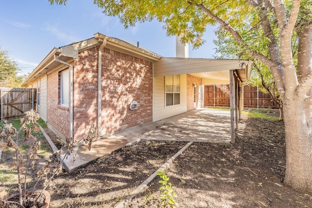 back of property with a patio area