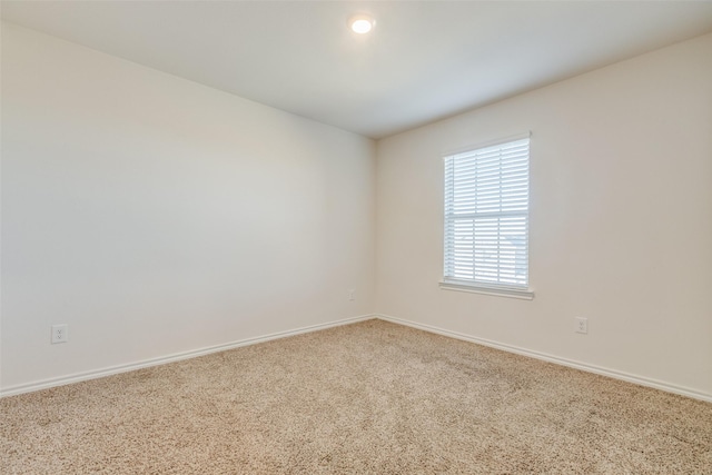 unfurnished room featuring carpet floors