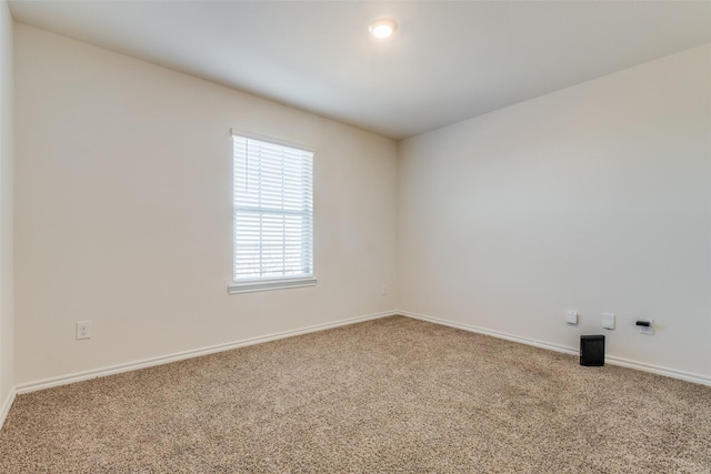 unfurnished room featuring carpet floors