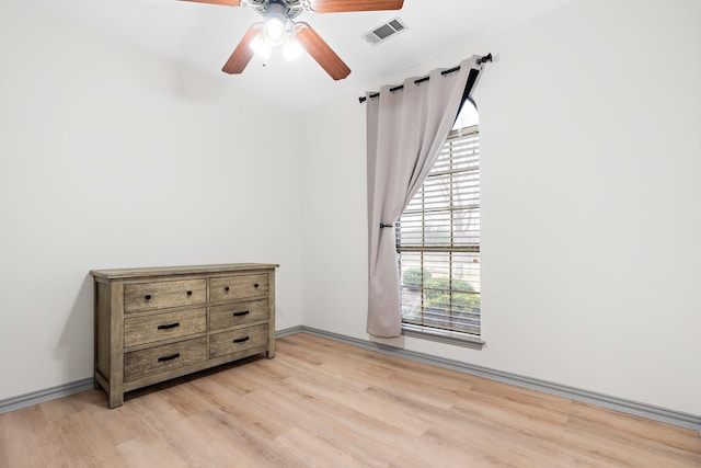 bedroom featuring ceiling fan and light hardwood / wood-style flooring