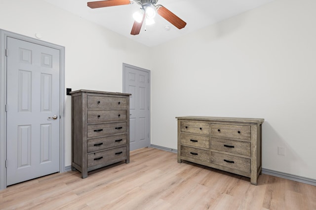 bedroom featuring ceiling fan and light wood-type flooring