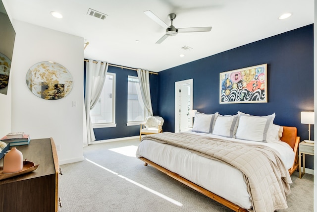 carpeted bedroom with ceiling fan