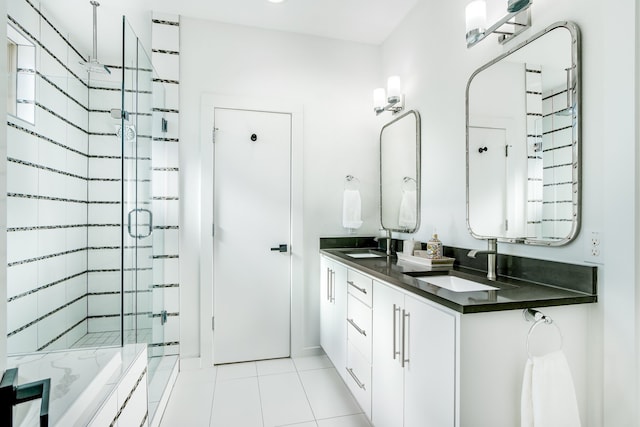 bathroom featuring vanity, tile patterned floors, and an enclosed shower