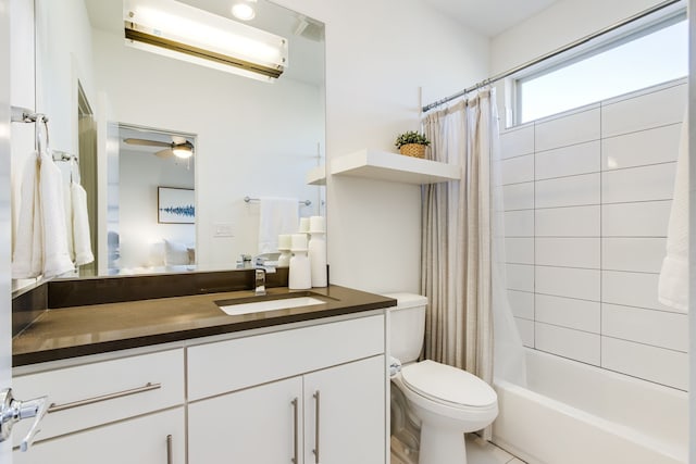 full bathroom featuring a wall mounted air conditioner, shower / bath combo, vanity, ceiling fan, and toilet