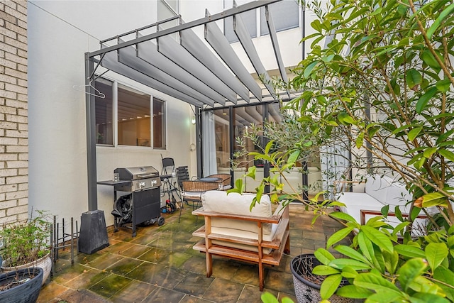 view of patio / terrace featuring a pergola and grilling area