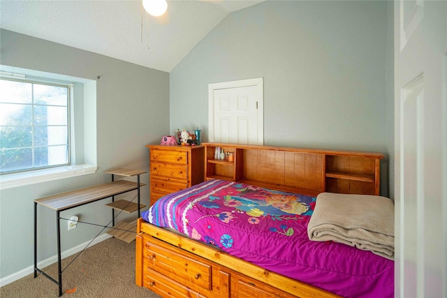 carpeted bedroom featuring vaulted ceiling