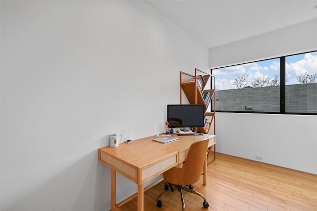 home office featuring light hardwood / wood-style floors