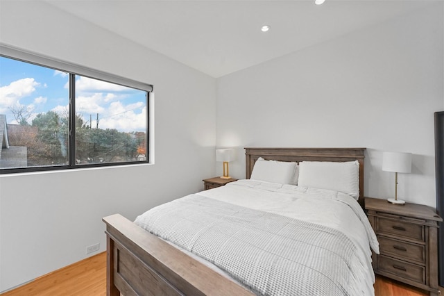 bedroom with light wood-type flooring